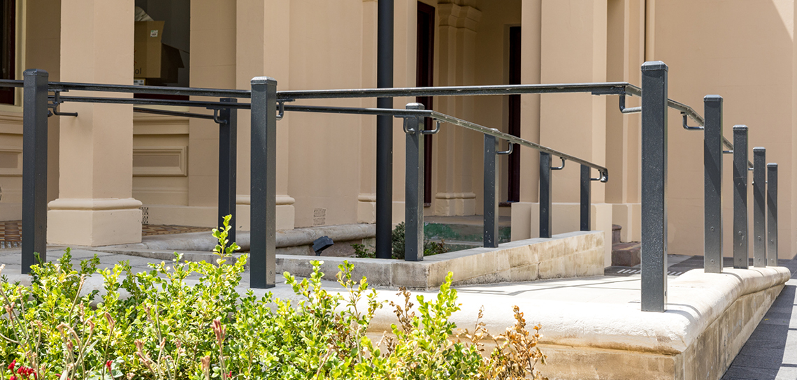 Close up of the accessibility ramp leading to the entrance of the original town hall building