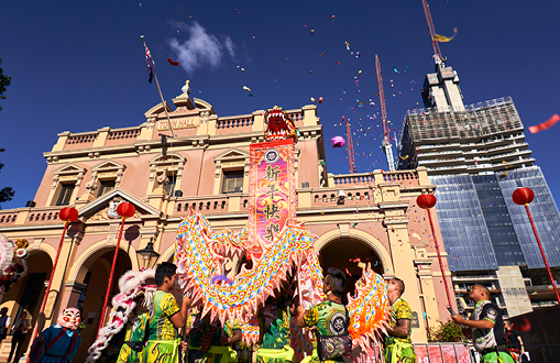 Image of a cultural festival being celebrated outside of the town hall