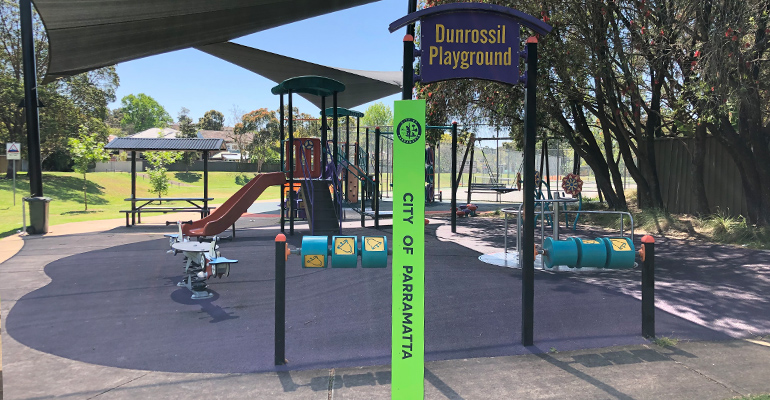 Dunrossil playground with courts in background