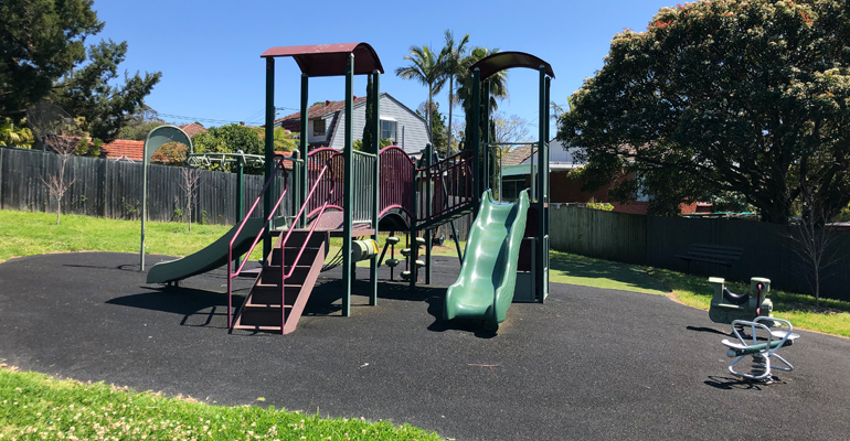 Playground with slides, stairs and rockers