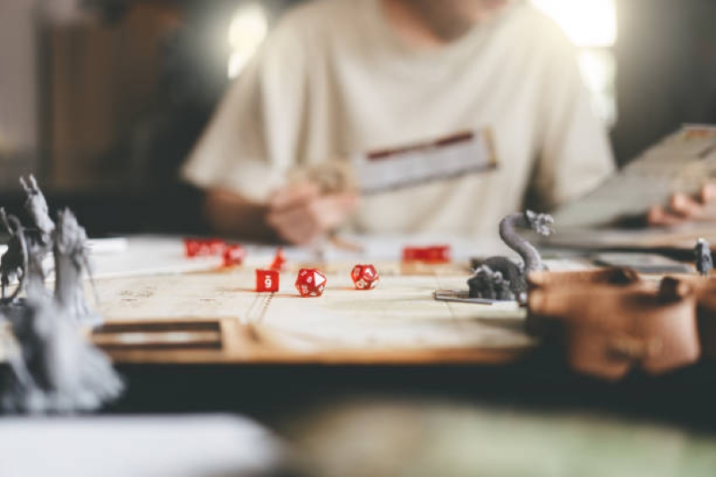 Table with game pieces and dice