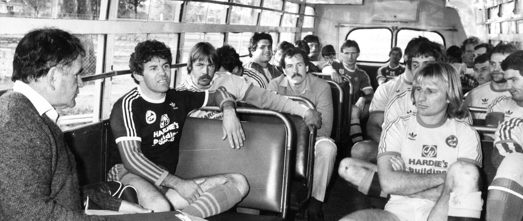 Photograph of the 1981 Parramatta Eels team sitting on a bus