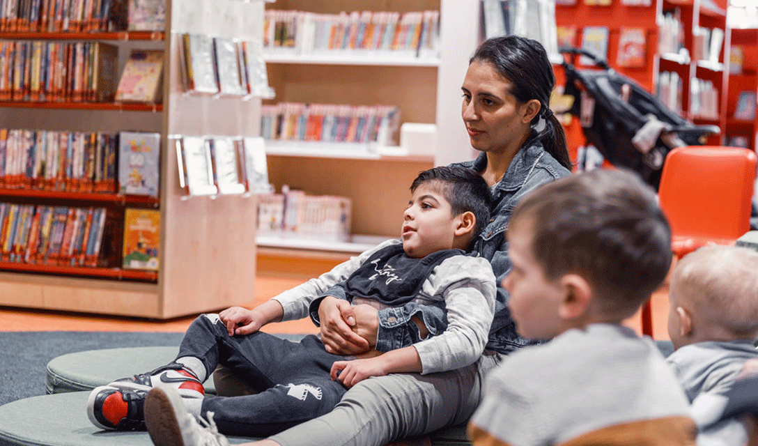 Children sitting with Mother