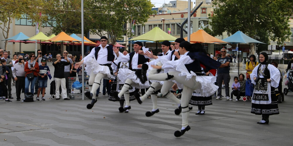 Traditional Greek dancers at the Greek Flag Raising in Centenary Square