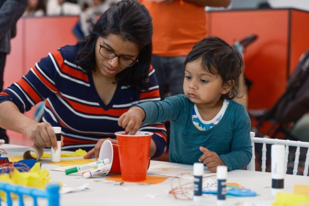 Mother and child doing craft activities