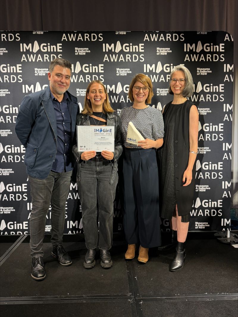 Man and Women receiving the awards