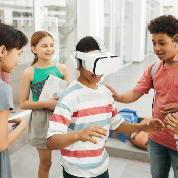 Children playing with VR technology