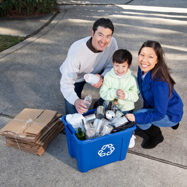 Family recycling bottles