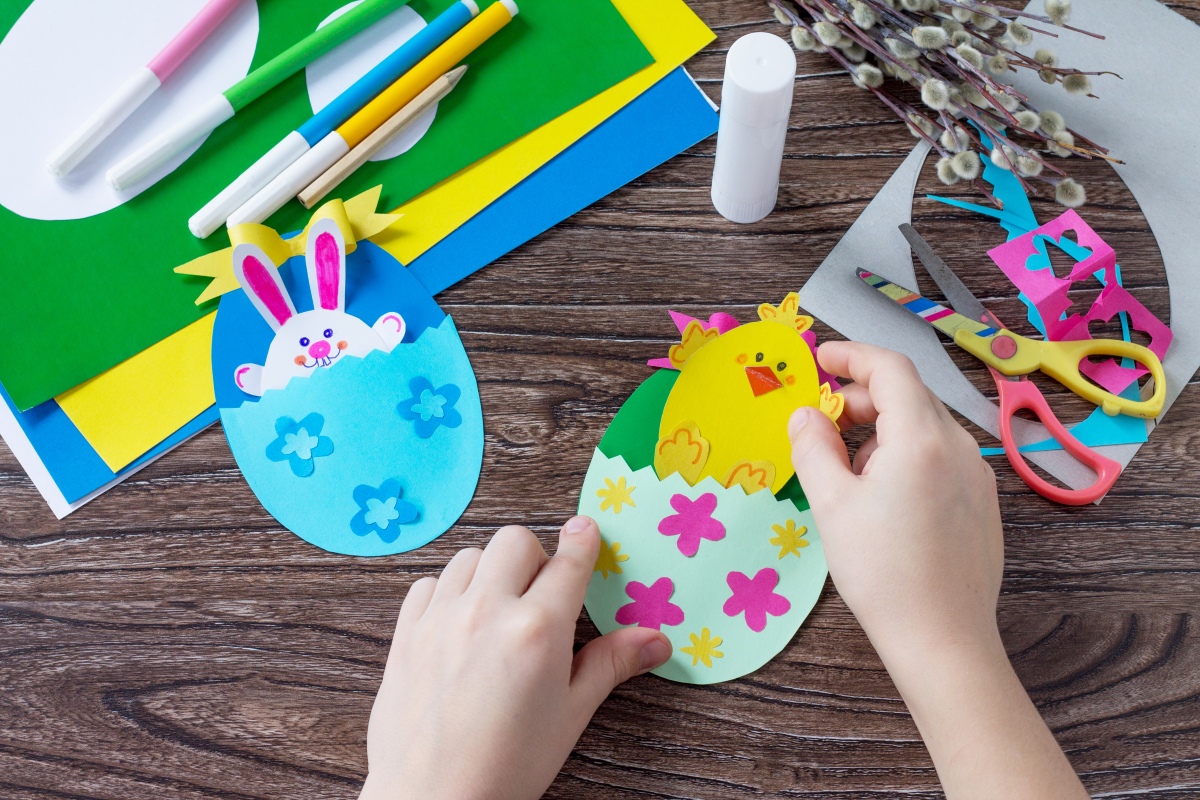 Hands at table doing Easter craft