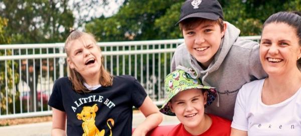 A family laughing. Image credit: Jay La Photography