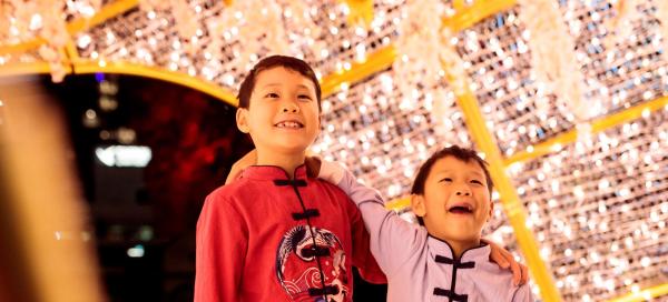 Two young boys in a light tunnel