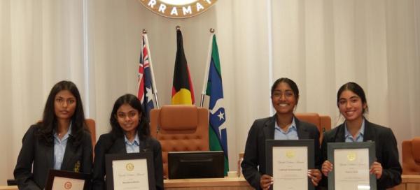 School children receiving award