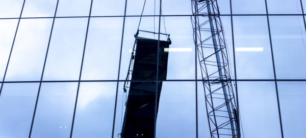 Crane lifting window cleaner platform 