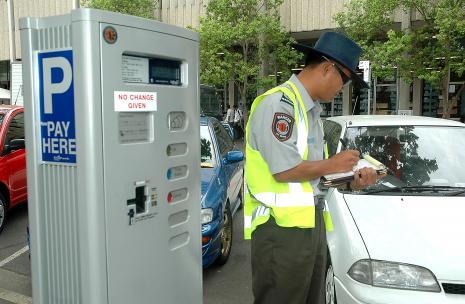 Parking Ranger issuing a fine.
