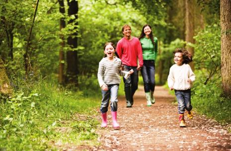 A family having fun walking along bushwalking tracks