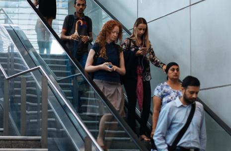 Commuters coming down stairs from Transport Interchange