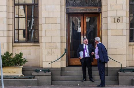 Two business men outside Westpac Bank in Parramatta